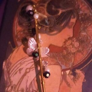 Elegant Gold and Black Hairpin with Butterfly Accent